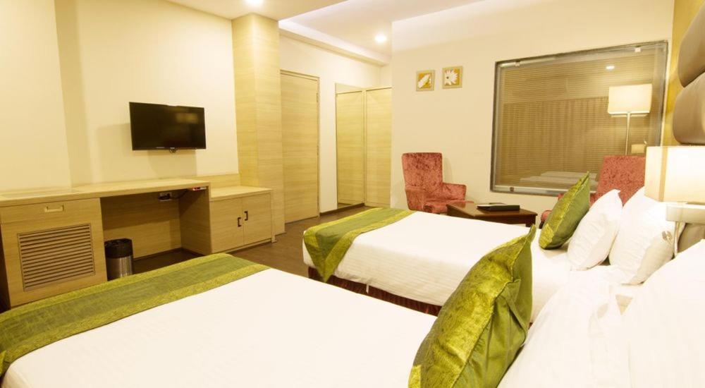 Kc Manor Hotell Jamshedpur Eksteriør bilde